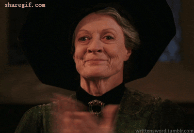 Woman in Black Hat Clapping