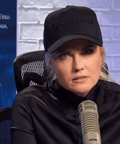 Woman In Black Hat Saying Freedom GIF