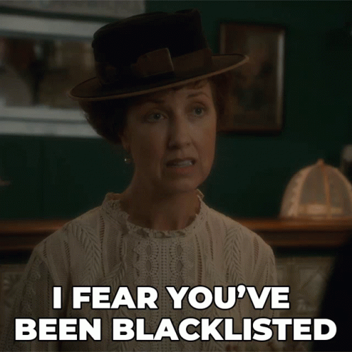 Woman In Black Hat Says I Fear You've Been Blacklisted GIF