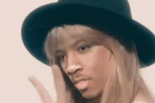 Woman In Black Hat With Mustache GIF