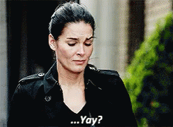 Woman in Black Jacket Asking Yay