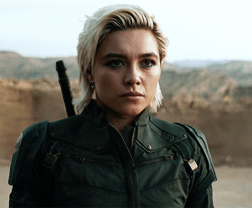 Woman In Black Jacket Holding Sword GIF