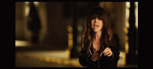 Woman in Black Jacket Laughing