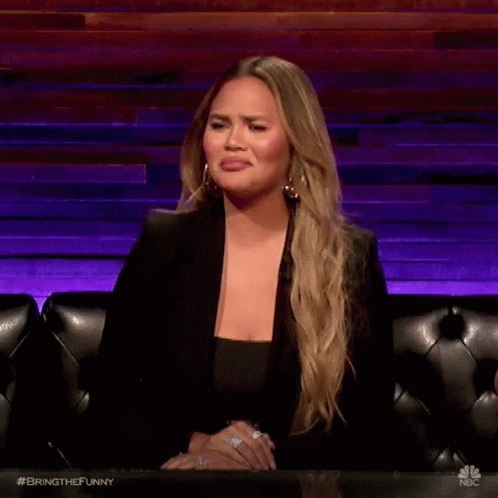 Woman In Black Jacket Making Funny Face GIF