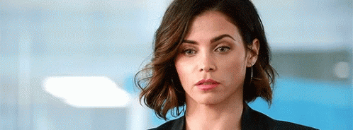 Woman in Black Jacket Making Serious Face
