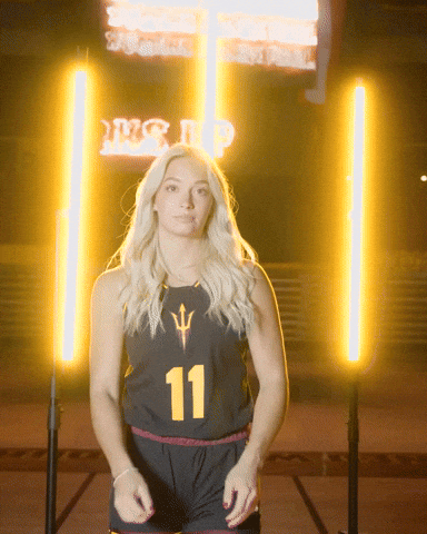 Woman in Black Jersey Number 11