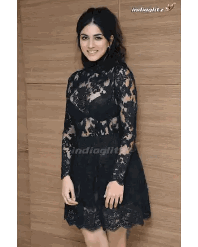 Woman in Black Lace Dress with Indiaglitz