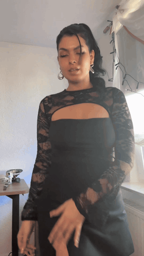 Woman In Black Lace Top Dancing GIF