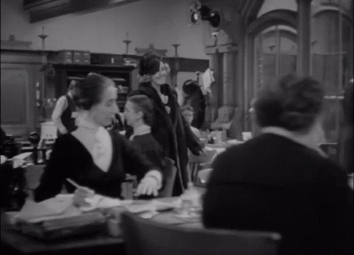 Woman In Black Leather Jacket And Gloves GIF