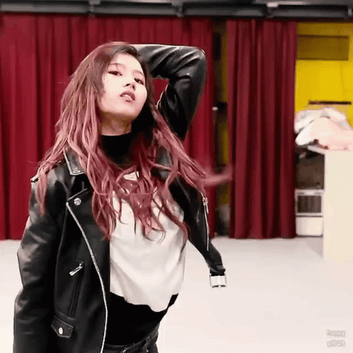 Woman in Black Leather Jacket Dancing Red Curtain