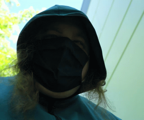 Woman In Black Mask And Hood GIF