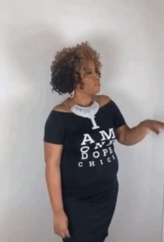 Woman In Black Off-Shoulder T-Shirt Pointing GIF