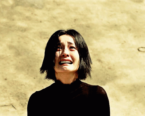 Woman in Black Shirt Crying with Smile