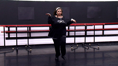Woman in Black Shirt Dancing Saying XSC