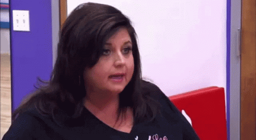 Woman in Black Shirt Making Funny Face