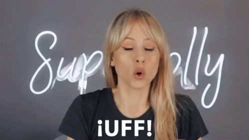 Woman in Black Shirt Saying Iuff with Superally Sign