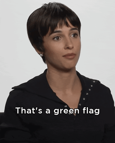 Woman in Black Shirt Saying That's a Green Flag