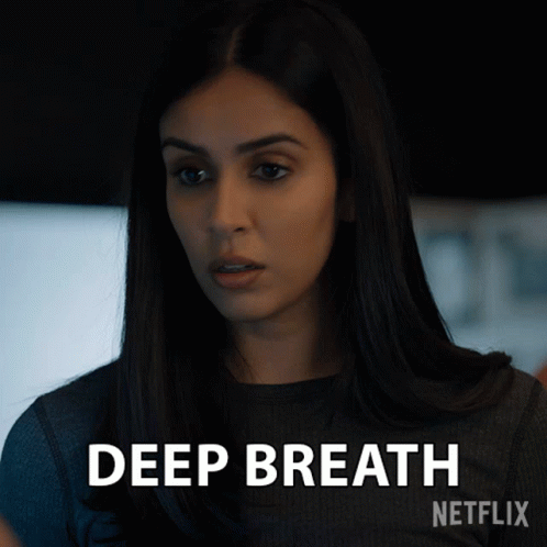 Woman In Black Shirt Says Deep Breath GIF