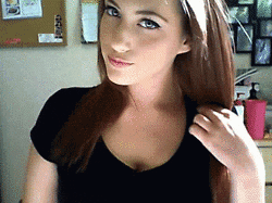 Woman In Black Shirt Standing Before Amanda Bulletin GIF