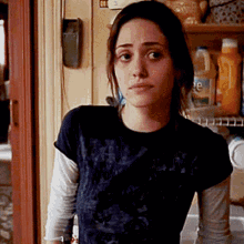 Woman in Black Shirt Standing in Kitchen