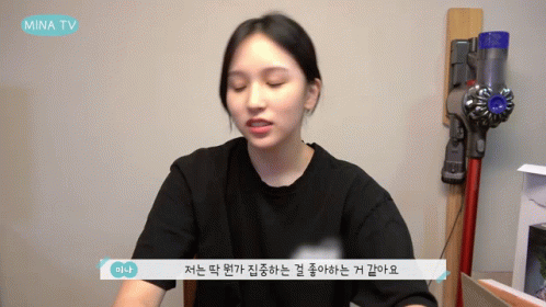 Woman in Black Shirt Vacuum Cleaner Mina TV