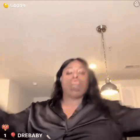 Woman in Black Shirt With Drebaby