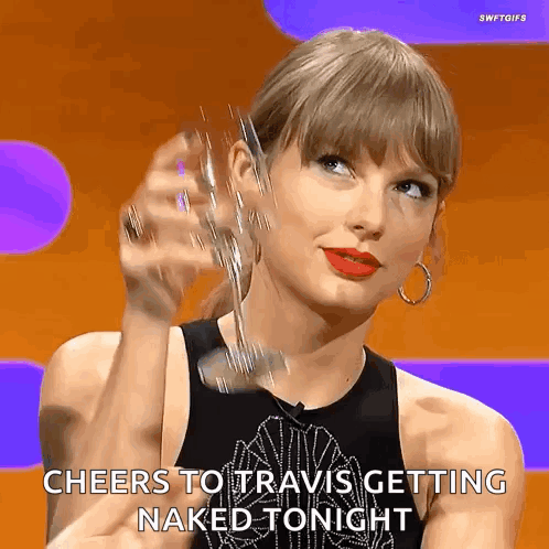 Woman in Black Tank Top Cheers to Travis Getting Naked Tonight