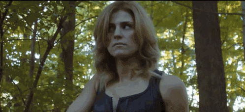 Woman in Black Tank Top in Forest