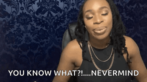 Woman in Black Tank Top Says You Know What? Nevermind