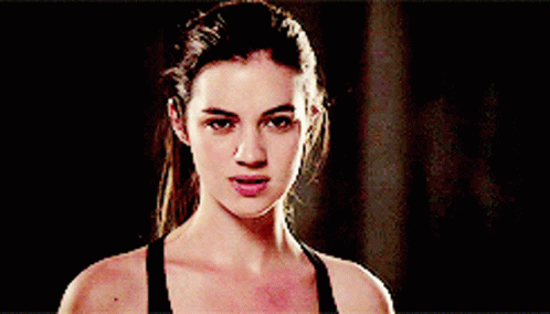 Woman In Black Tank Top Smiling Funny Face GIF