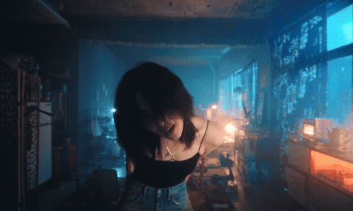 Woman In Black Tank Top GIF