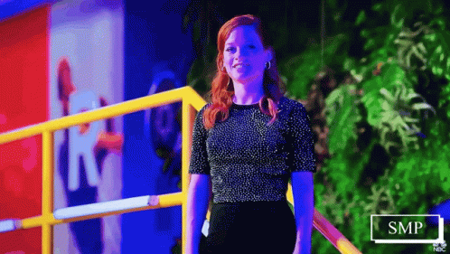 Woman In Black Top And Black Skirt By Railing GIF