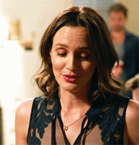 Woman in Black Top and Gold Necklace