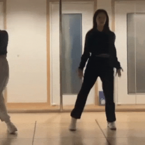 Woman in Black Top Dancing