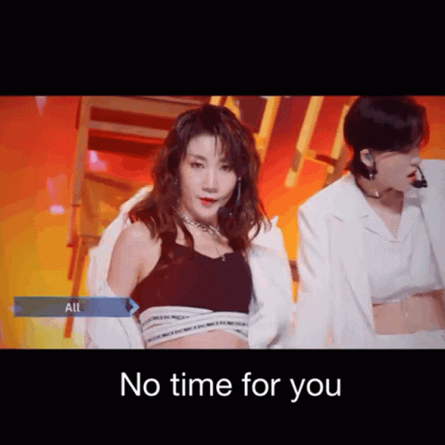 Woman in Black Top Next to Man in White Suit No Time For You