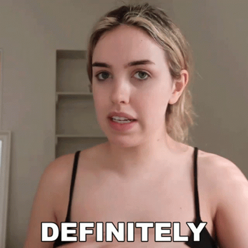 Woman in Black Top Saying Definitely