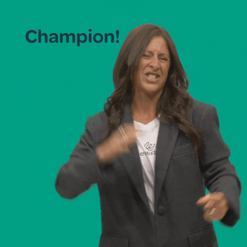 Woman in Blazer and White Shirt With Champion