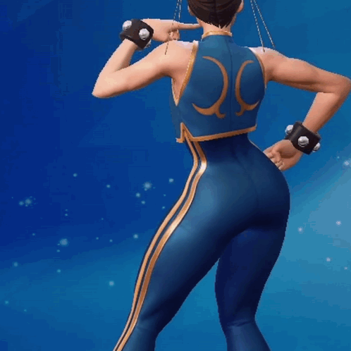 Woman in Blue and Gold Costume With Letter S