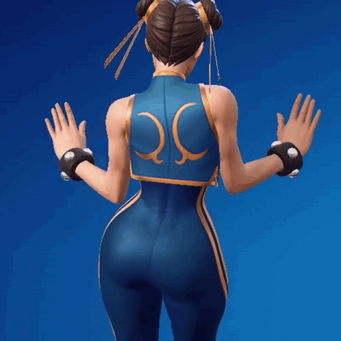 Woman in Blue and Gold Outfit With Q on Back
