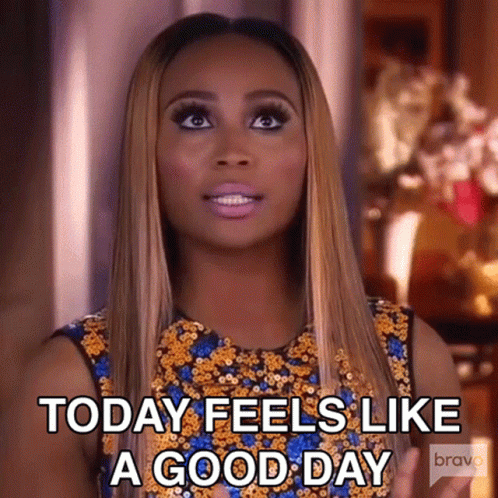 Woman in Blue and Gold Sequined Dress Says Today Feels Like a Good Day