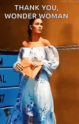 Woman in Blue and White Dress Saying Thank You Wonder Woman
