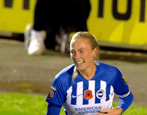Woman In Blue And White Striped American Express Jersey Smiling GIF