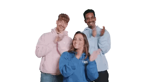 Woman in Blue Applauding With Men in Pink