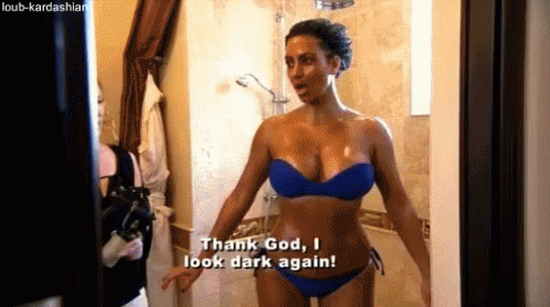 Woman in Blue Bikini Saying Thank God I Look Dark Again