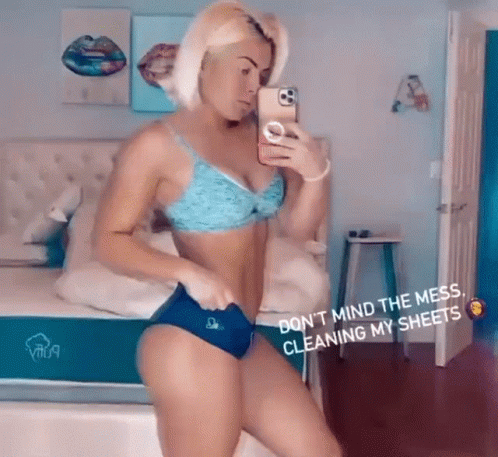 Woman in Blue Bikini Taking Selfie