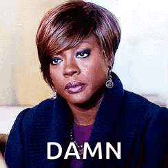 Woman in Blue Coat Making Funny Face Saying Damn