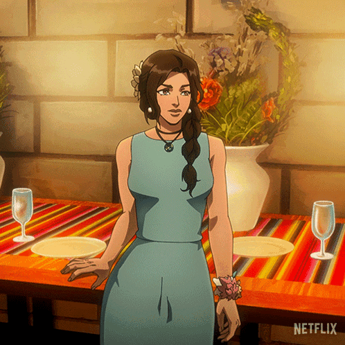 Woman in Blue Dress at Table With Netflix Logo