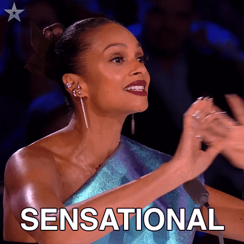 Woman in Blue Dress Clapping Sensational