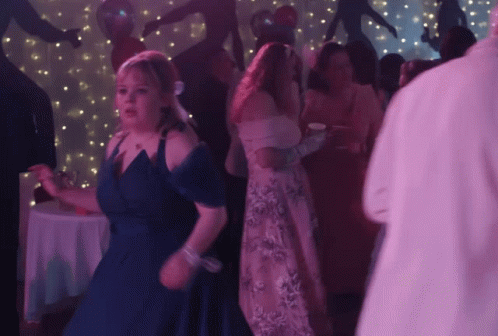 Woman in Blue Dress Dancing
