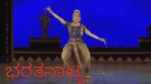 Woman in Blue Dress Dancing Red Bharatanatyam